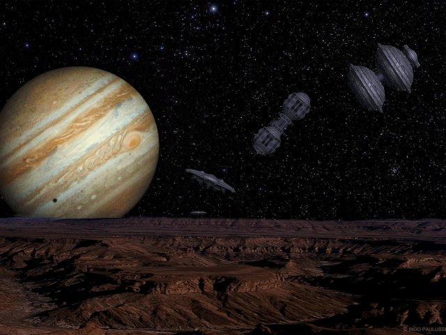 Prospektoren landen auf dem Jupitermond Io, der seinen Schatten auf den Planeten wirft. Ihr Stützpunkt ist eine Modul-Raumstation.