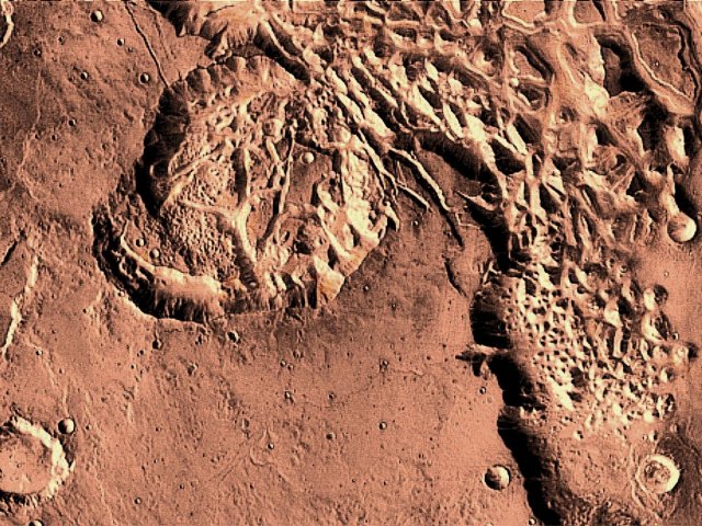 Die separierte Bucht des Hydraotes Chaos der Valles Marineris ist in meinen Multiversum- und Kinderromanen Standort einer Landschaftskuppel. Stark vergrößert, geschärft schattiert und eingefärbt